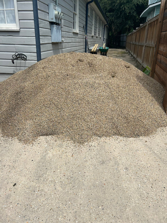 Bulk 3/8 inch river gravel pea gravel delivered by the ton on the Mississippi Gulf Coast